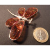 broche libellule en ambre avec inclusion